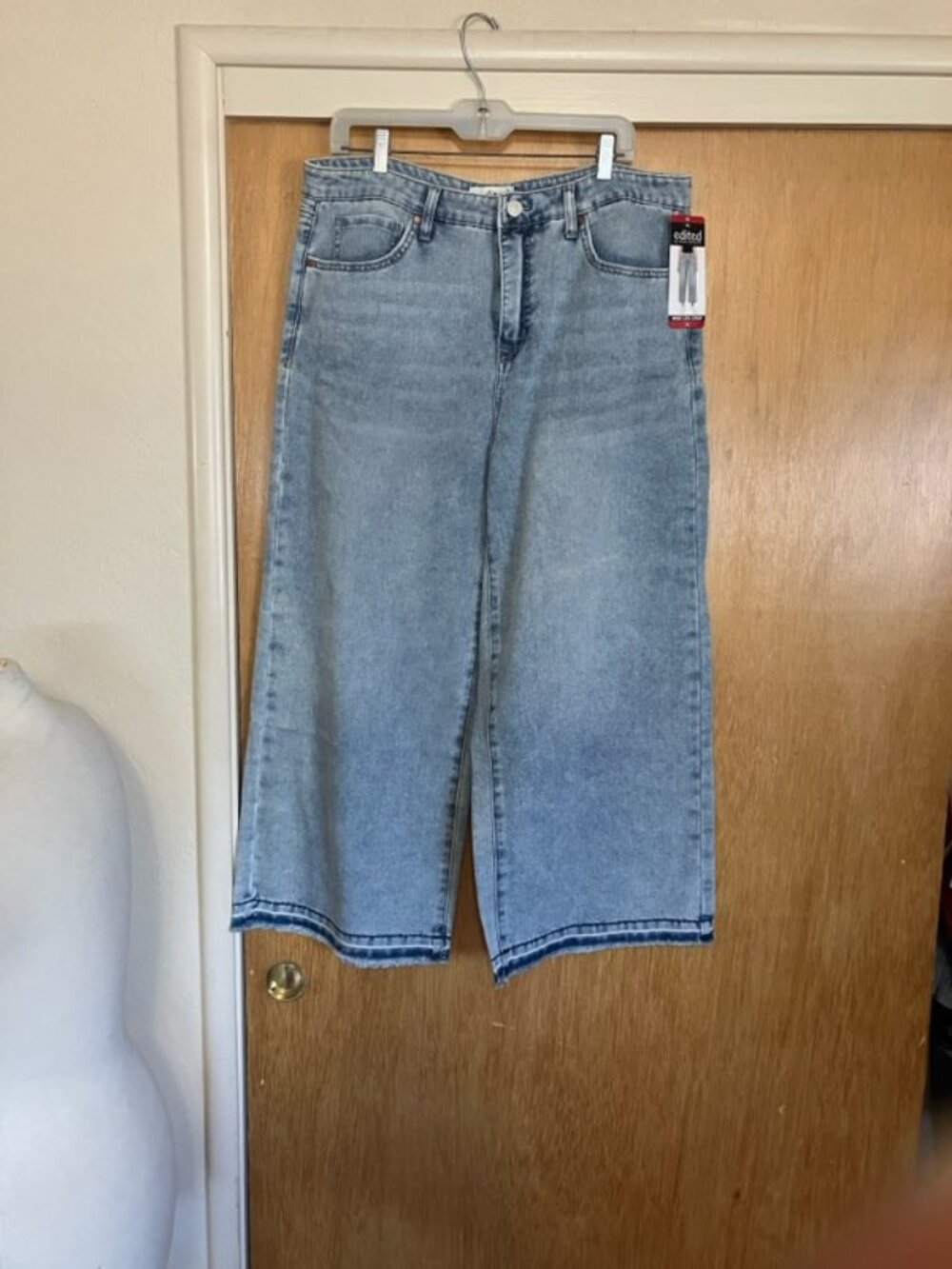 Edited light wash denim cropped Jeans